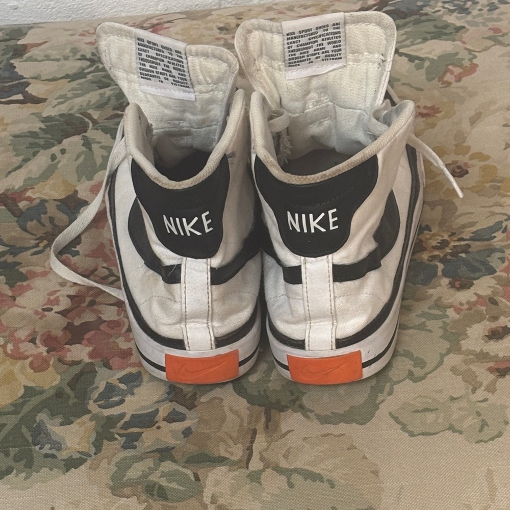Nike White and Black High-Top Sneakers with Orange Heel Tab